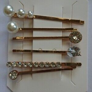 A set of 6 pearls/crystals hair clips